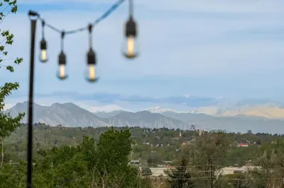 a group of lights with mountains in the background at Hot Tub With Rooftop A Game Room And5 Bathrooms in Denver