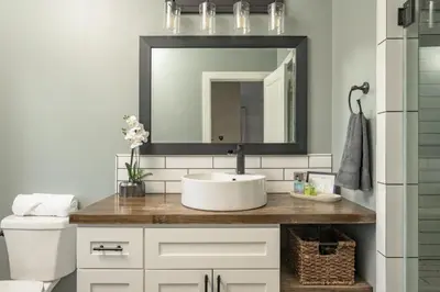 a bathroom with a sink and a mirror at Luxe 4BR Mtn Retreat With Stunning Views Near Ski AndHikes in Nederland