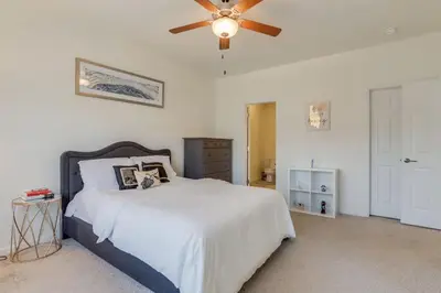 a bedroom with a bed and a ceiling fan at Beautiful New Townhome in Denver