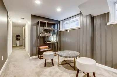 a room with a table and two chairs and a table at The Bonsai Bungalow With A Hot Tub And A Game Room in Denver