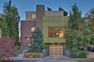a house with a garage in front of it at Skyline House An Eco Efficient Luxury Home in Denver