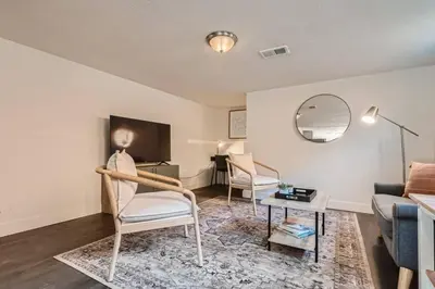 a living room with a couch and a table at Sleeps 10 And Pet Friendly Home In Denver Near Red Rocks in Denver