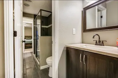 a bathroom with a sink and a toilet at Near to DIA Airport retreat And 20 Min To Downtown Denver in Henderson