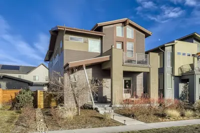 a house on a street at New Central Park Home Near DIA And 20mins to Downtown in Denver
