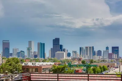 a view of a city skyline with tall buildings at Luxury Loft With Skyline Viwes In RiNo in Denver