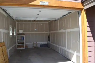 an empty garage with the door open at Luxury condo with stunning views! in Fraser