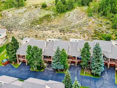 an aerial view of a house with trees at Spacious Keystone Family Escape Great Location in Keystone