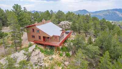 an aerial view of a house on a mountain at Golden Oasis in Golden