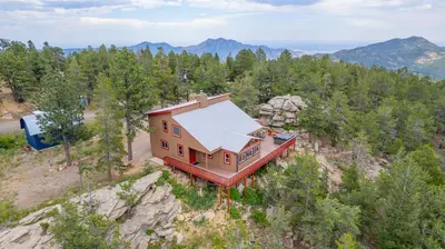 an aerial view of a house on a mountain at Golden Oasis in Golden