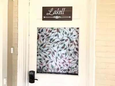 a door with a floral print on it at Charming Studio Apartment in the Heart of Golden in Golden