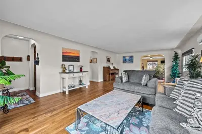 a living room with a couch and a table at 180 S Hoyt in Lakewood