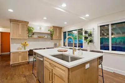 a kitchen with a sink and a counter at BRAND NEW Classic Fire Pit 2 Kings Pet Friendly in Arvada