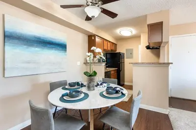 a kitchen and dining room with a table and chairs at Johnny André Velásquez gutierrez in Aurora