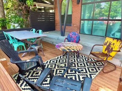 a group of chairs and a table on a patio at Unique denver loft in rino art district in Denver