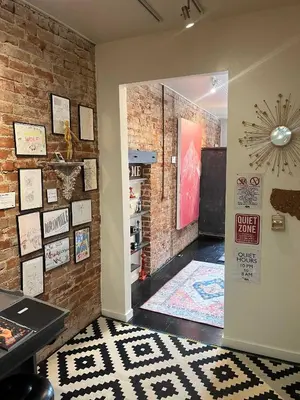a room with a brick wall and a door at Unique denver loft in rino art district in Denver