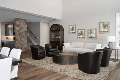 a living room with a couch and chairs and a table at Lone Eagle 855 in Granby