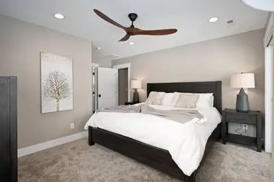 a bedroom with a bed and a ceiling fan at Lone Eagle 855 in Granby