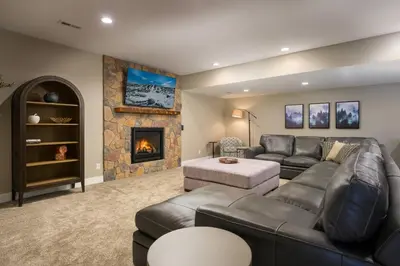 a living room with a couch and a fireplace at Lone Eagle 855 in Granby
