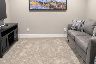 a living room with a couch and a tv at Lone Eagle 855 in Granby