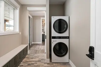 a laundry room with two washer and dryer at Lone Eagle 855 in Granby