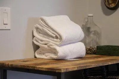 a stack of towels sitting on top of a table at Premium Unit 1305 - Zephyr Mountain Lodge condo in Winter Park