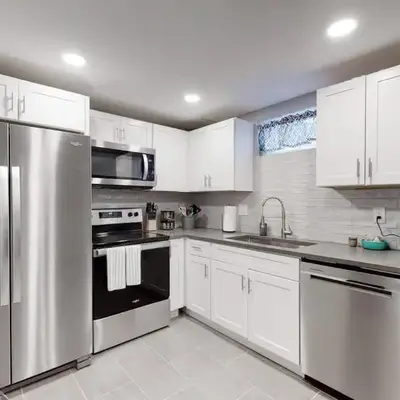 Bright basement unit with large yard and sunroom