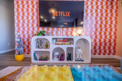 a play room with a hello kitty playset at Near Airport, 3BR, Stock Tank Pool, Mini-Golf, Game Rm in Commerce City