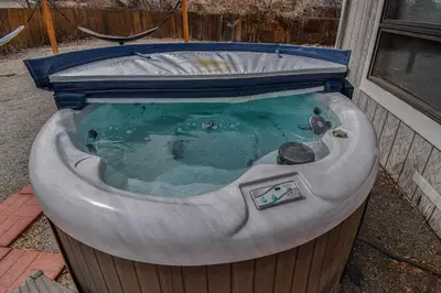 a jacuzziificialificialificialificialificialificialificialificialificialificialificial at Sunny Family Home in Denver with huge yard and hot tub in Denver