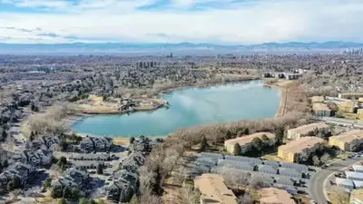 an aerial view of a city with a body of water at Sunny Family Home in Denver with huge yard and hot tub in Denver