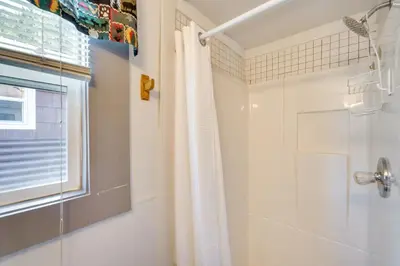 a bathroom with a shower and a shower curtain at 8 Mi to Rocky Mountain Natl Park Serene Escape in Drake