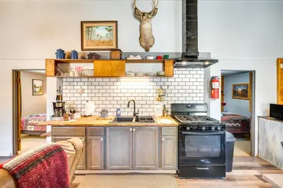 a kitchen with a sink and a stove at Private Hot Tub and Fishing On-Site Cabin in Drake in Drake