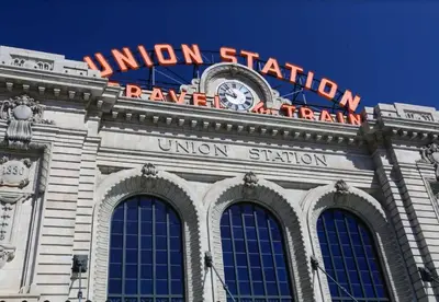 a building with a union station sign and a clock on it at Awesome Two Bedroom Family Upper Unit in Denver in Denver