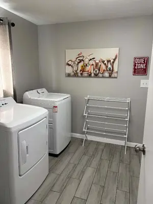a laundry room with a washer and dryer at Arvada Private Family Home with Two King Beds in Arvada