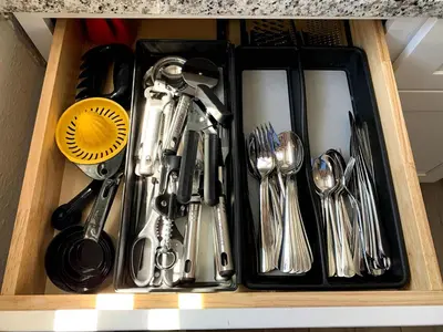 a tray filled with utensils in a drawer at Great Updated King Bed Near Denver Sports field and concerts in Commerce City