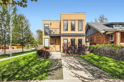 a home in the suburbs with a driveway at With Pool Table Near to RiNo and City Park in Denver