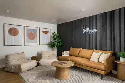 a living room with a couch and a table at Spacious and Stylish Home with HotTub 12min to Downtown in Westminster