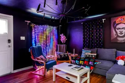 a living room with a couch and a table at Denver Hype House - 8 min to DT in Denver