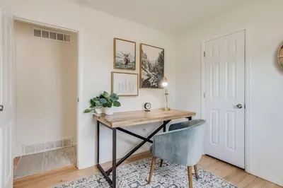 a home office with a desk and a chair at Spacious and Stylish Home With Fast Wifi and Near to Downtown in Denver