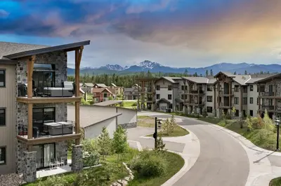 arial view of a apartment complex with a winding road at Downtown Fraser with Hot Tub in Fraser