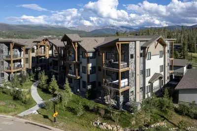 an aerial view of an apartment complex at Downtown Fraser with Hot Tub in Fraser