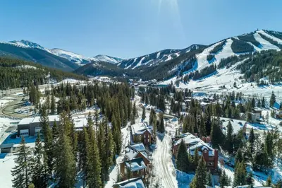 an aerial view of a ski resort in the snow at Rocky Mountain Retreat Steps to Slopes with Hot Tub and Spectacular Views in Winter Park