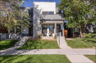 a house with a lawn in front of it at New Build and Pet Friendly Near to Highlands and RiNo in Denver