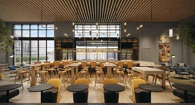 a restaurant with tables and chairs in a room at Limelight Boulder in Boulder