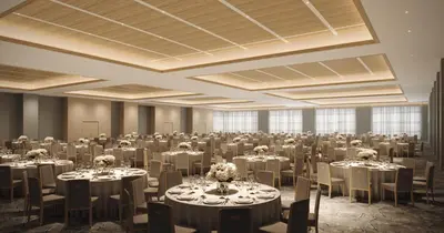 a large banquet hall with tables and chairs at Limelight Boulder in Boulder