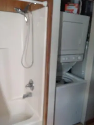 an open refrigerator with a sink and an oven at Colorado Cabin Adventure in Grand Lake