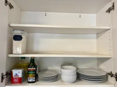 a refrigerator with plates and bottles and dishes in it at 10 min Red Rocks & FAMILY FRIENDLY & 7min to I70 & STR-25-0008 in Golden