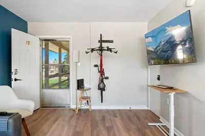 a room with a cross hanging on the wall at 10 min Red Rocks & FAMILY FRIENDLY & 7min to I70 & STR-25-0008 in Golden