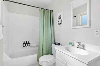 a bathroom with a sink and a toilet and a shower at 10 min Red Rocks & FAMILY FRIENDLY & 7min to I70 & STR-25-0008 in Golden