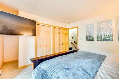 a bedroom with a bed in a room at 1 Mi to Rocky Mtn Natl Park Estes Park Townhome in Estes Park