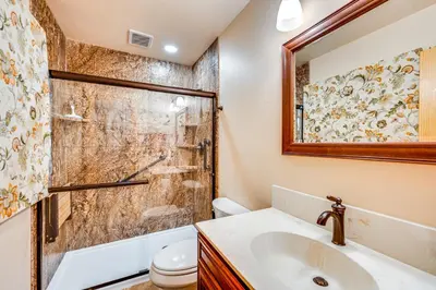 a bathroom with a shower and a sink at 1 Mi to Rocky Mtn Natl Park Estes Park Townhome in Estes Park